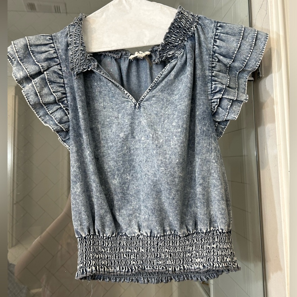 Denim sleeveless top. Brand “Entro” size medium.
